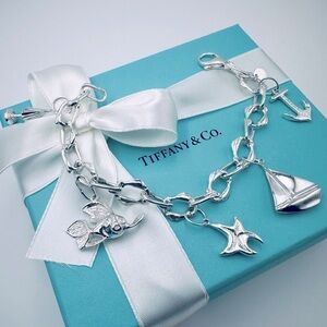 RARE Tiffany & Co. Nautical Charm Bracelet 7.25” Star Anchor Fish Boat Packaging